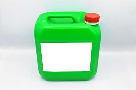 Plastic green plastic detergent bottle, cosmetic container, isolated on white backgroundの写真素材