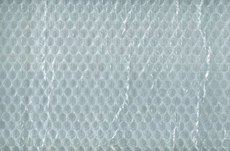 Plastic air bubble protection foil wrap texture background, air bubble packing texture