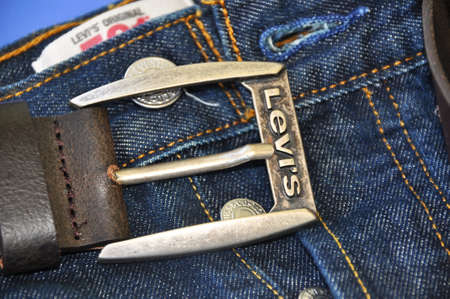 Levi's denim jeans brown leather belt and silver buttons, Istanbul Tのeditorial素材