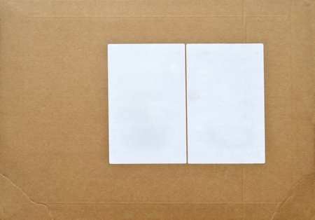 Brown and beige cardboard paper mail envelope on sticker label. Can be used in company correspondenceの写真素材