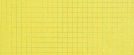 Checkered stripes clean yellow page paper, checkered notebook paper textureの写真素材