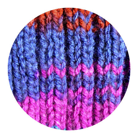 Pattern fabric made of wool. Handmade knitted fabric colored wool background texture