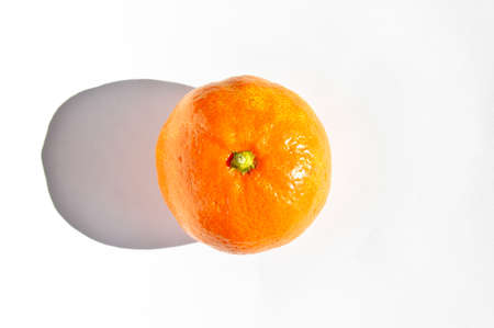 Fresh juicy and ripe orange tangerine clementine, isolated on white backgroundの写真素材