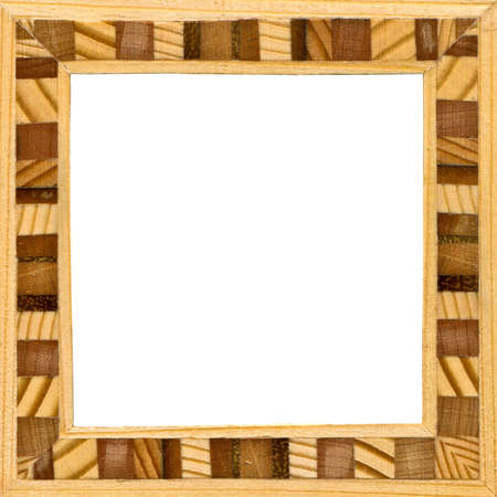 Wooden marquetry frame, wooden frame made from a combination of different woods, isolated on a white backgroundの写真素材