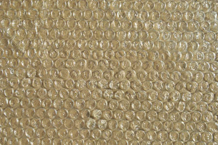On corrugated cardboard paper plastic air bubble protection foil wrap texture background, air bubble...