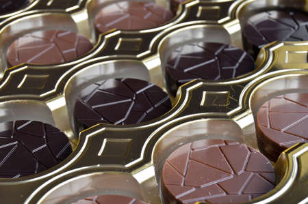 Very tasty round chocolates with milk and bitter, in stylish decorative box