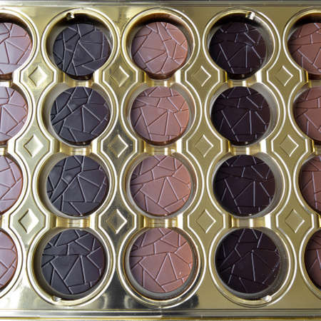 Very tasty round chocolates with milk and bitter, in stylish decorative box