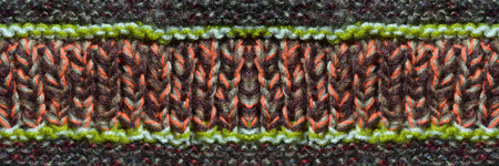 Pattern fabric made of wool. Handmade knitted fabric colored wool background texture