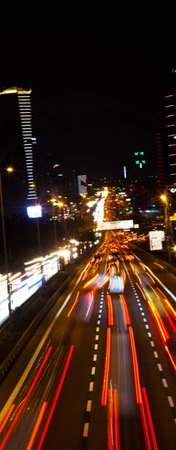 Istanbul Turkey D 100 highway Maltepe Esenkent stop congested evening traffic, lights of the city and cars, September 11 2022のeditorial素材