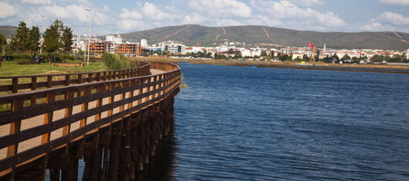Istanbul Turkey Tuzla Kamil Abdus Lake and its surrounding residential area, green areas and wooden pier around the lake, August 30 2022のeditorial素材