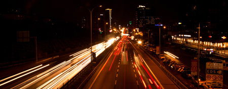 Istanbul Turkey D 100 highway Maltepe Esenkent stop congested evening traffic, lights of the city and cars, September 11 2022のeditorial素材
