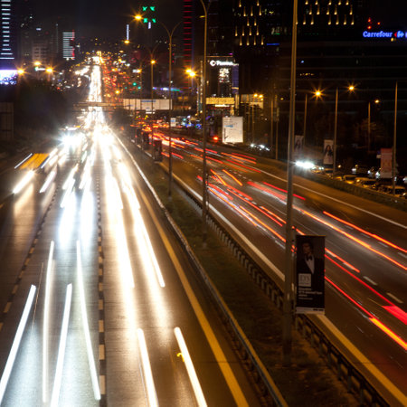 Istanbul Turkey D 100 highway Maltepe Esenkent stop congested evening traffic, lights of the city and cars, September 11 2022のeditorial素材