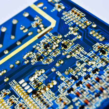 High tech electronic circuit board, isolated on white backgroundの写真素材