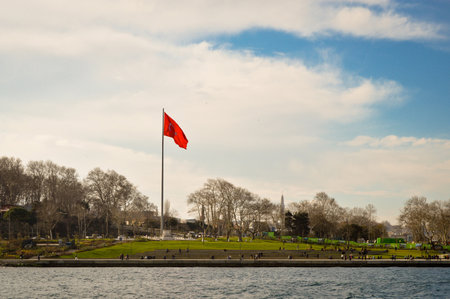 Topkapi Palace, in front of Gulhane Park, Sarayburnu greenery area and big Turkish Flag, historical peninsula and Istanbul Turkey, January 21 2023のeditorial素材