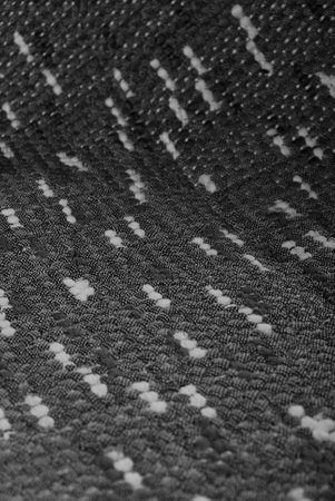 Seamless black and white carpet rug texture background from above, carpet material pattern texture...