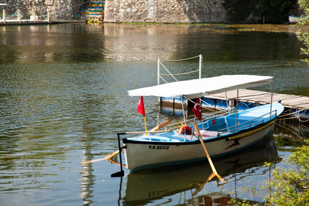 Touristic sightseeing wooden boats around Ulubat or Uluabat Lake in Bursa, Turkey, June 25 2023のeditorial素材