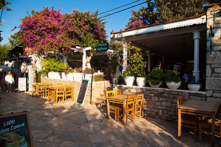 Old Datca streets with its unique architecture and people making touristic trips, Mugla Datca Turkey, June 29 2023のeditorial素材