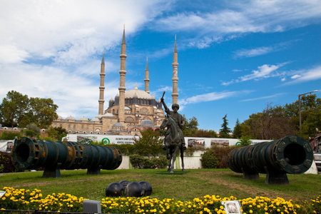 Statue of Mimar Sinan, who built the Selimiye Mosque in 1575, and old big cannons, 09 August 2019 Turkey Edirneのeditorial素材