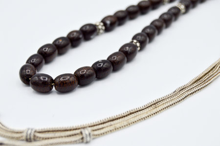 Black and silver beads sequenced, short rosary, tespih tesbih, an important accessory for Turkish culture, isolated on white backgroundの写真素材