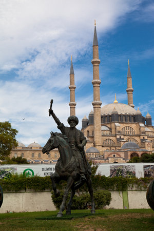 Statue of Mimar Sinan, who built the Selimiye Mosque in 1575, and old big cannons, 09 August 2019 Turkey Edirneのeditorial素材