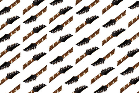 Close-up of electric guitar steel strings and fretboard made of rosewood rest, music related banner work, isolated on white backgroundの写真素材