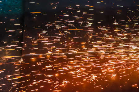 Sparks from metal welding at a construction site. High quality photo