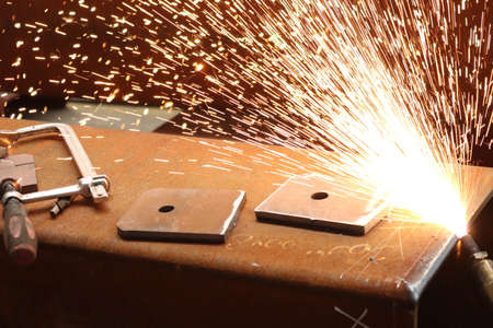 Welding metal with sparks close-up. High quality photo