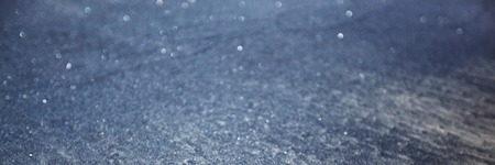 Amazing black sparkling beach sand texture background