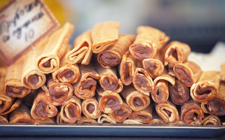 Delicious sweet buffet with rolled waffles with chocolate creamの写真素材