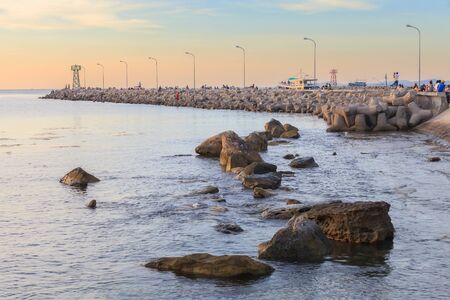 Doung Dong, Phu Quoc island, Vietnam - Vietnamese people spending time on local pier at sunset
