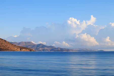 Crete island, seascape: mountains over blue waters of Mediterranean seaの写真素材