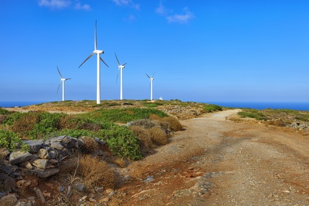 Crete island, Greece: windsmills in mountains over the seaの写真素材