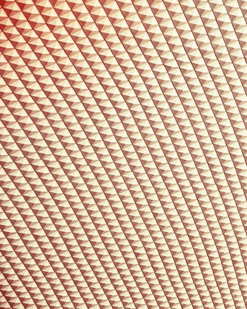 Abstract close-up view of modern aluminum ventilated triangles on facade