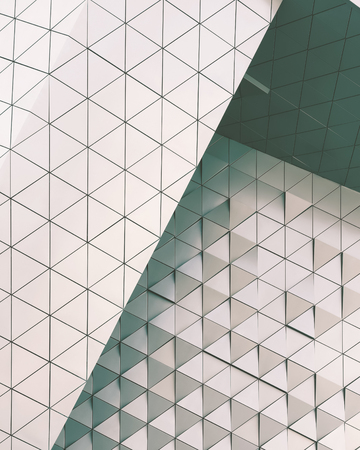 Abstract close-up view of modern aluminum ventilated facade of trianglesの写真素材