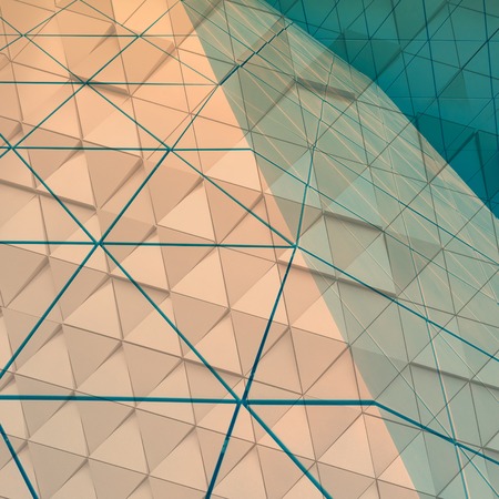 Abstract close-up view of modern aluminum ventilated facade of trianglesの写真素材