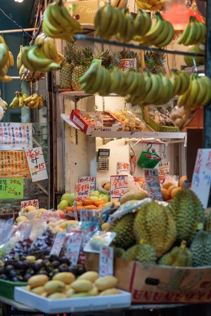 Hong Kong, Special Administrative Region of the People's Republic of China - 19 April 2016: fresh exotic fruits sold on traditional asian marketのeditorial素材
