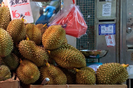 Hong Kong, Special Administrative Region of the People's Republic of China - 19 April 2016: Durians sold on traditional asian marketのeditorial素材