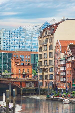 Picturesque view of Altstadt of Hamburg, Deichstrasse with philharmonie on backgroundの写真素材