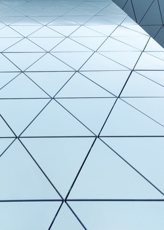 Abstract architectural 3D illustration of blue triaglesの写真素材