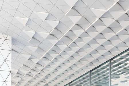 Abstract shot of facade with white triaglesの写真素材