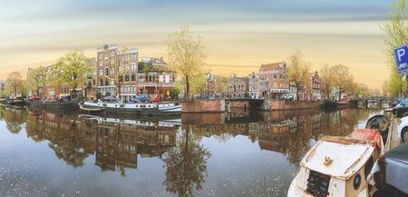 Canals of Amsterdam. Moody panorama of Rossebuurt districtの写真素材