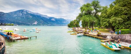 Lake of Annecy. Moody landscape with boatsの写真素材