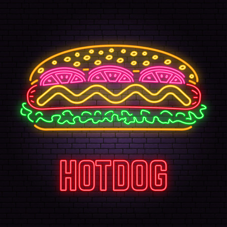 Retro neon hot dog sign on brick wall background. Design for cafe, hotel, restaurant or motel.の写真素材