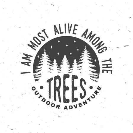I am most alive among the trees. Vector illustration. Concept for shirt or logo, print, stamp or tee. Vintage typography design with forest and starry night sky silhouetteのイラスト素材