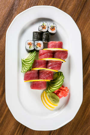 fresh Sushi rolls on a white plateの写真素材