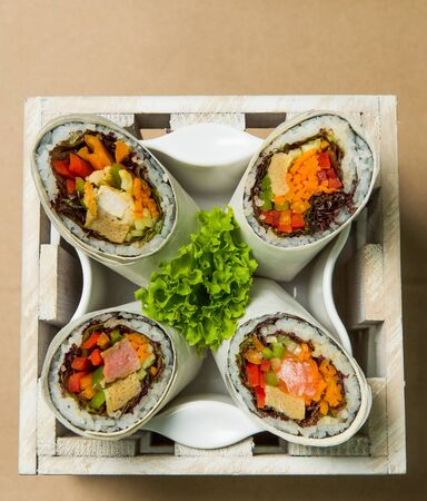 Burritos wraps with chicken and fresh vegetables in close upの写真素材
