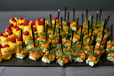 Delicious canapes as event dish on a plateの写真素材