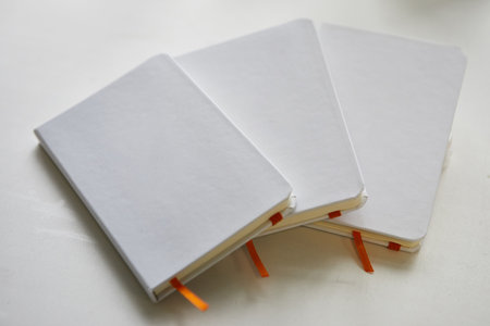 stylish white notepads beautifully lying on the table