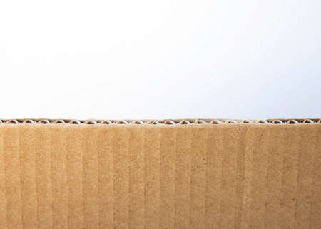 Background the tip of a cardboard box on a white background a place for text eco-friendly packagingの写真素材