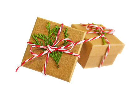 Christmas holiday gift boxes isolated. New Year DIY present boxes wrapped craft paper decorated with...